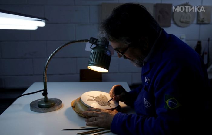 Nelson Carneiro, craftsman from the Casa da Moeda do Brasil (Brazilian Mint) works on the Rio 2016 Olympic medal mold in Rio de Janeiro