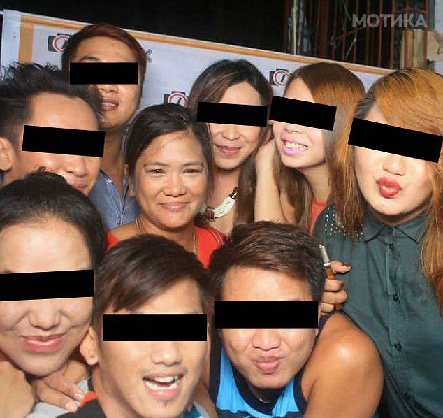 Marie Caparas with a group of 'chatters' in North Hills Village.jpeg